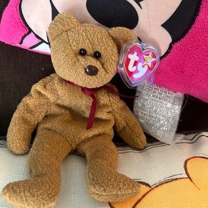 Curly bear Ty beanie baby with error hang tag 1996 & tush tag 1993 & brown nose